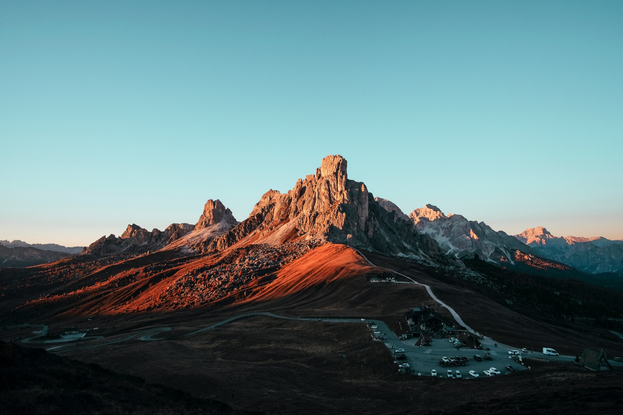 Rocky mountains highlighted by a powerful sunrise.